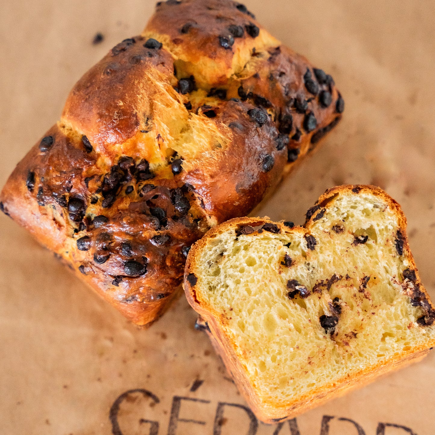 Chocolate brioche loaf topped with a golden crust, crafted with premium Belgian flour.