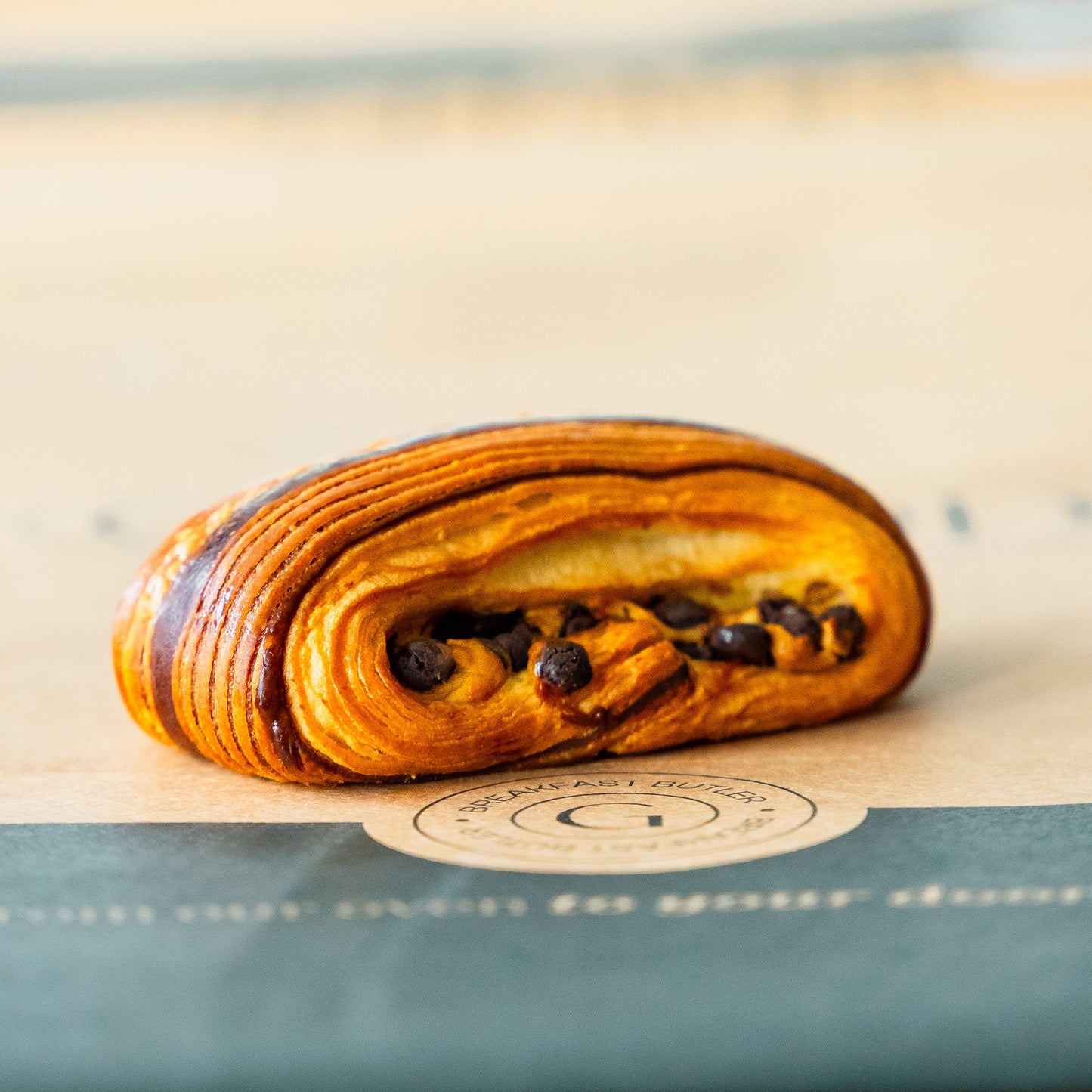 Close-up of a Chocolate twister with rich chocolate filling, showcasing its artisan quality