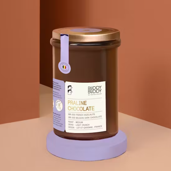 Hazelnut chocolate spread from Buddy Buddy laying on the counter.