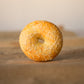 A perfect golden flaky bagel.