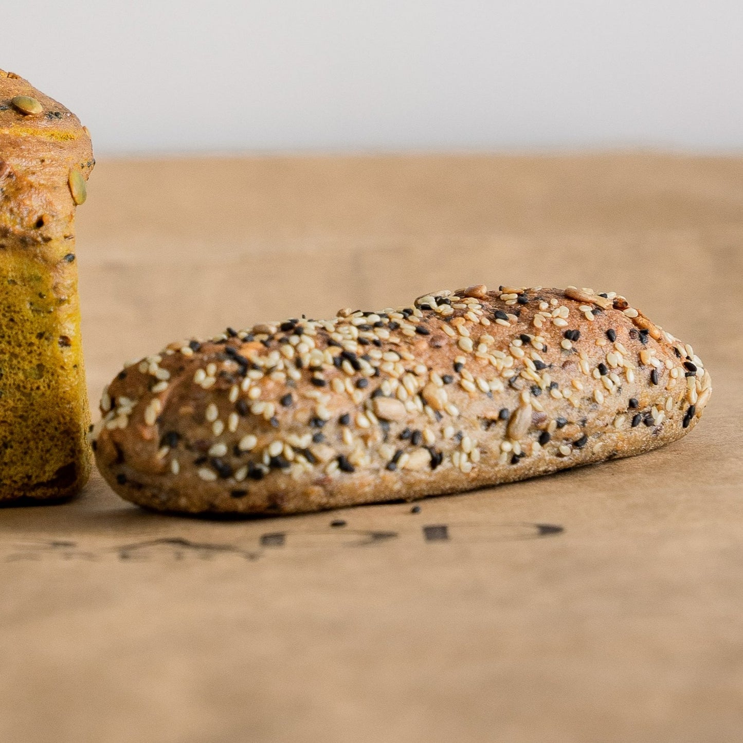 Gluten free baguette topped up with different grains.