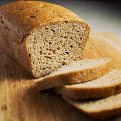 A vegan gluten free bread cut up in loafs.